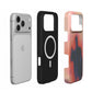 Inside of the Umbra case: black lining with the built-in MagSafe magnet ring, shown next to an iPhone