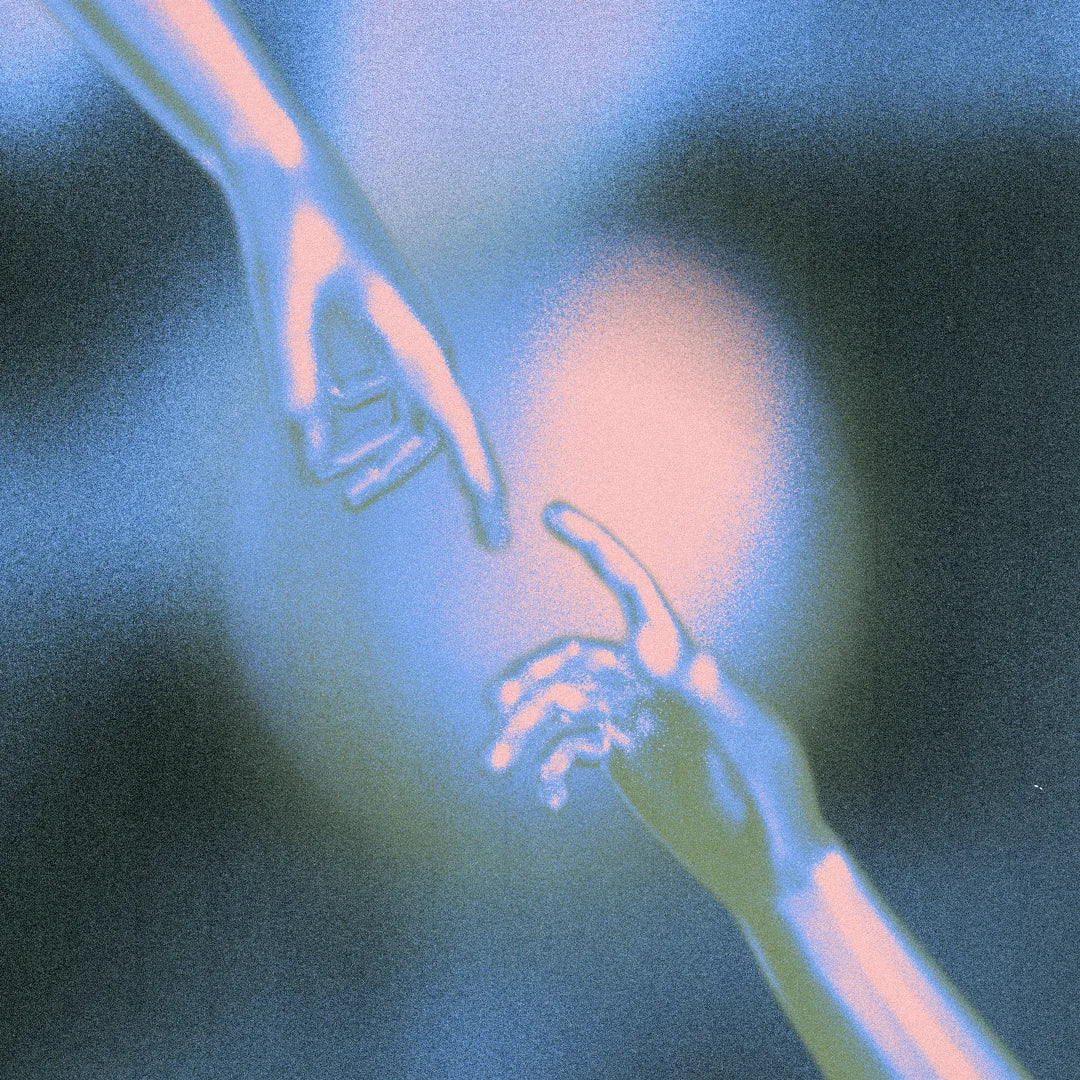 Two hands reaching through a grainy blue and peach glow